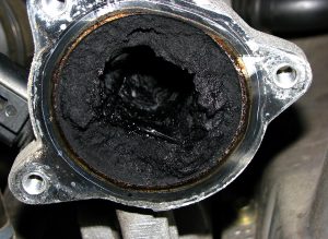 Thick black carbon buildup inside a motor without a catch can